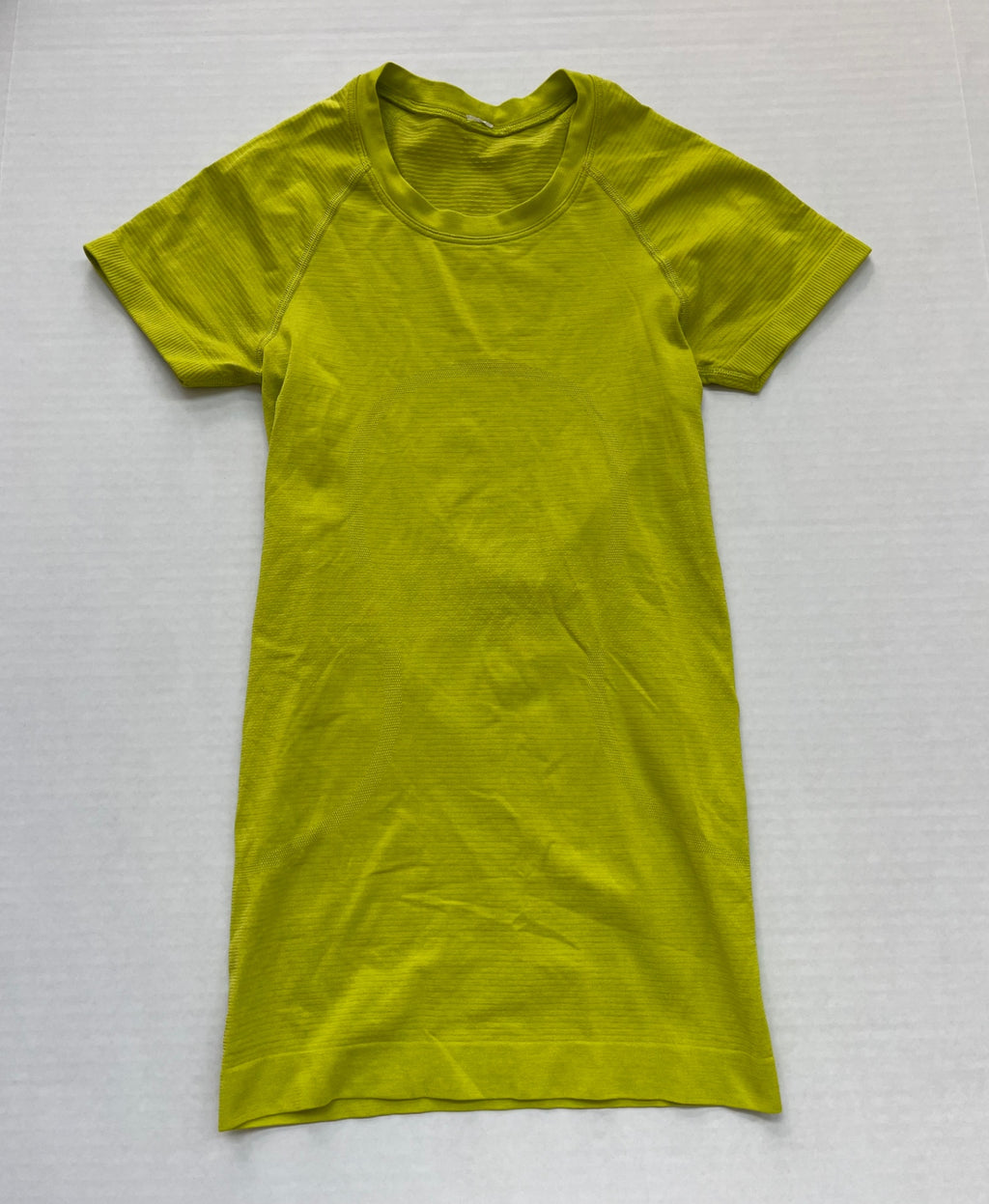 Lululemon Tops 0-2 Yellow Technical fabric with mesh panels and moisture-wicking properties