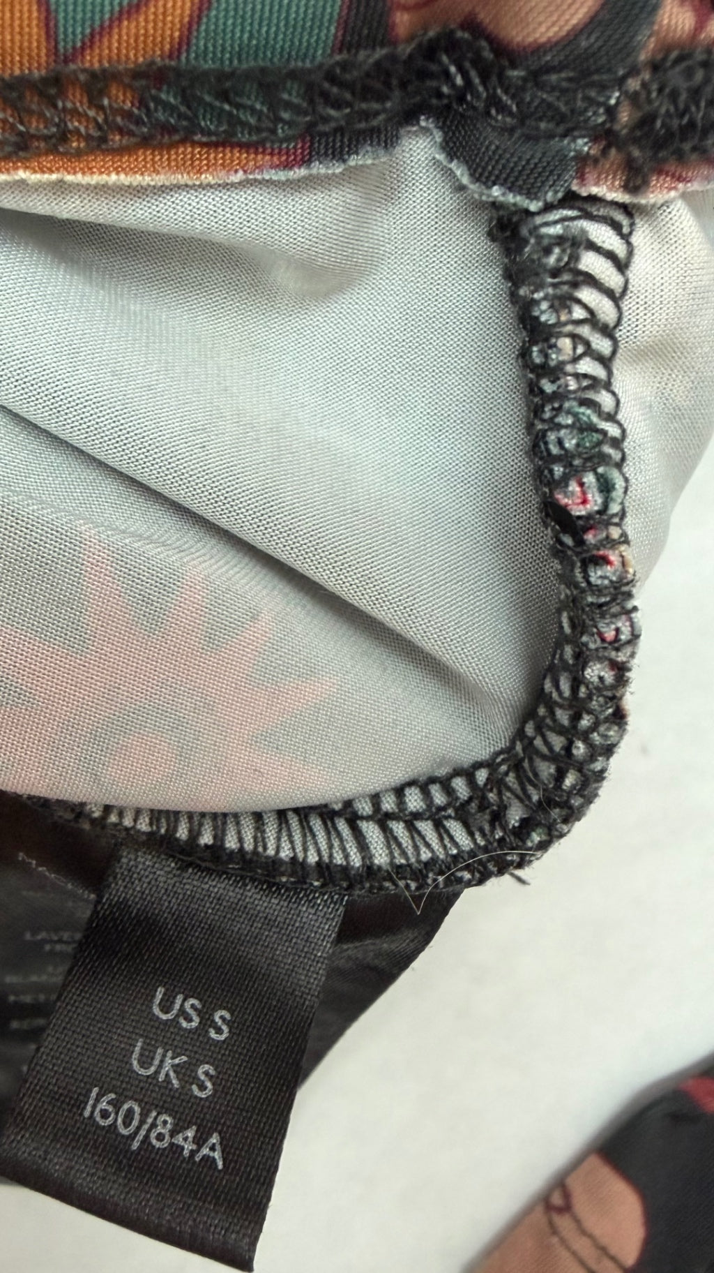 Urban Outfitters Tops Small Multicolor (Black, Red, Orange, and other shades)Polyester, Elastane, and possibly some printed fabric