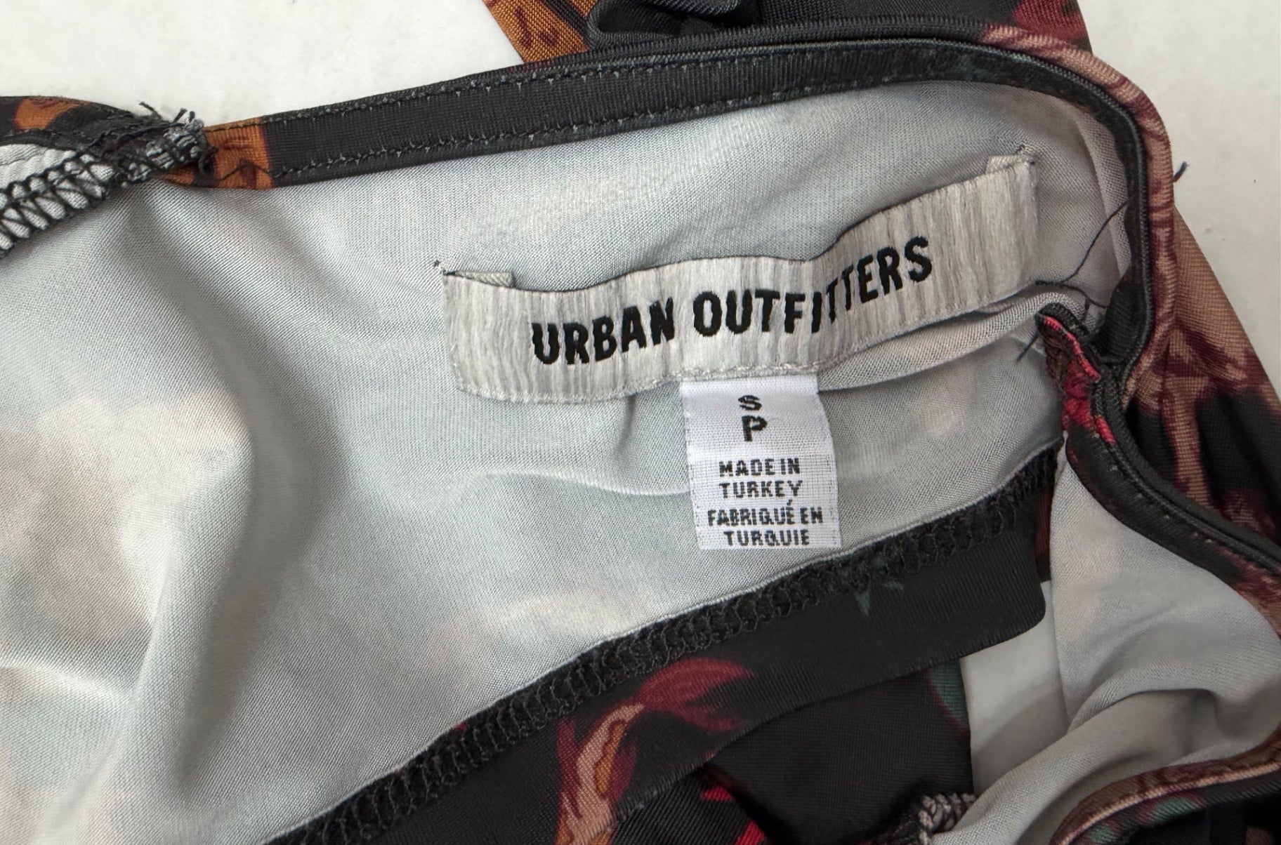 Urban Outfitters Tops Small Multicolor (Black, Red, Orange, and other shades)Polyester, Elastane, and possibly some printed fabric