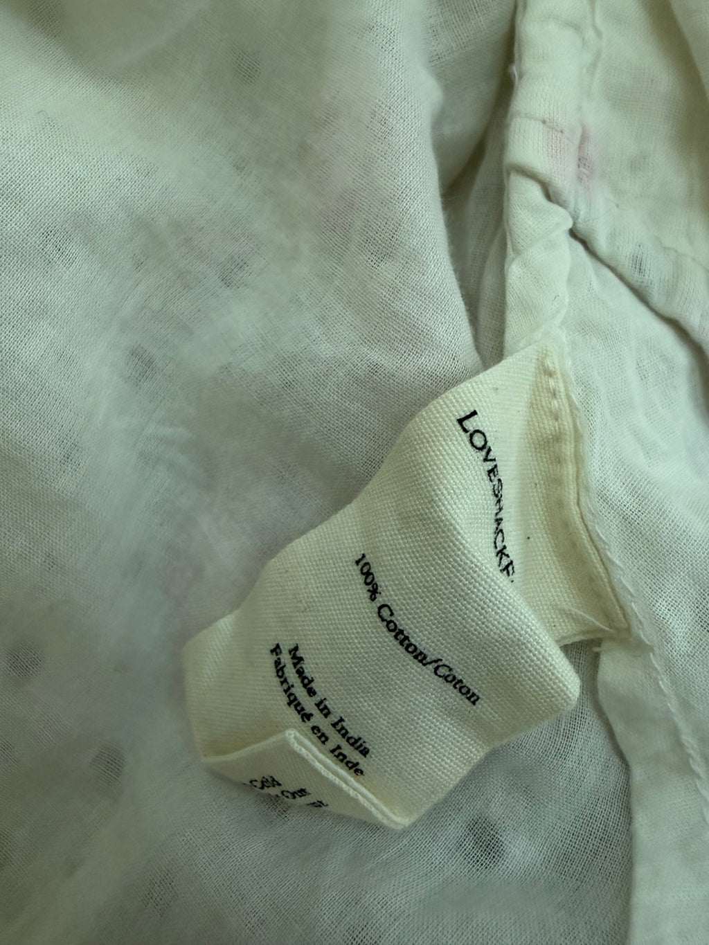 LOVESHACKFANCY Dresses/Rompers Extra Small Off-white/Beige with pink, purple, and gray floral printCotton eyelet fabric with floral print and smocked bodice